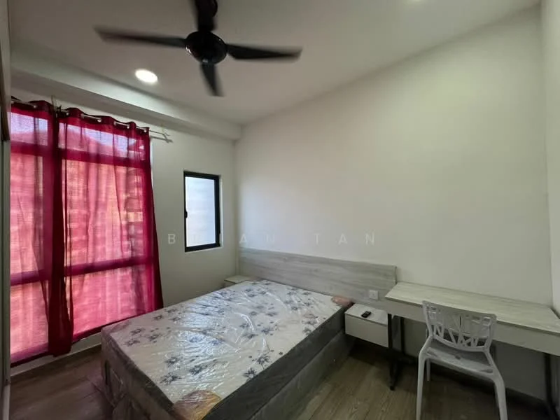 Bedroom features: queen-size bed, wooden bed frame, study desk, white plastic chair, red curtains, window with black frame, light-colored walls, wooden flooring, ceiling fan with light, nightstand with drawer; style: modern.