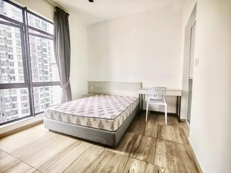 Bedroom features: queen-size bed, wooden bed frame, white desk, plastic chair, floor-to-ceiling windows, grey curtains, light wood flooring, plain white walls; style: modern; view: city.