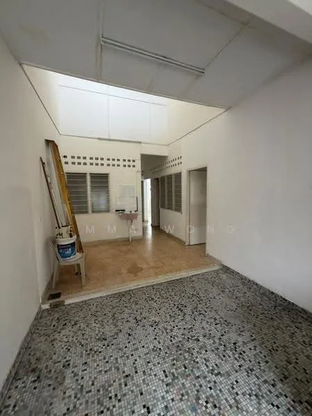 Room features: white painted walls, exposed ceiling with fluorescent lighting, mosaic tile flooring, large windows for natural light, ladder against the wall, utility sink, open layout, ventilation grilles; style: minimalist.