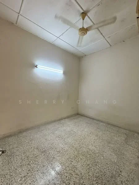 Room features: plain white walls, concrete flooring, ceiling fan, fluorescent light fixture, no visible windows, neutral color scheme; style: minimalist.