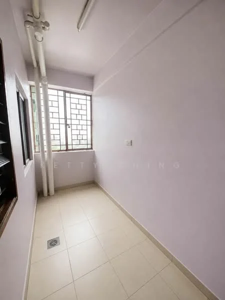 Room features: light purple painted walls, white ceiling, tile flooring, single window with grid pattern, wall-mounted ventilation pipes, floor drain, built-in shelving unit, corner space.