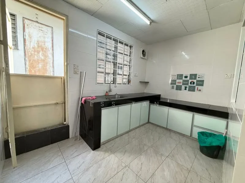Kitchen features: black countertop, white cabinetry with glass panels, single-bowl stainless-steel sink, chrome faucet, wall-mounted ventilation unit, tile backsplash with decorative pattern, white tiled walls, grey tiled flooring, window with metal grille, door leading outside; style: modern.