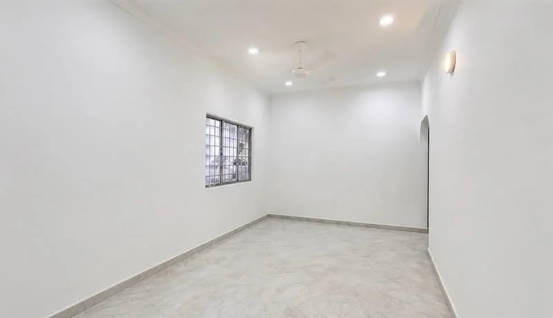 Room features: white painted walls, marble tile flooring, ceiling fan, recessed downlights, window with metal grille, neutral color scheme, corner entry door, no visible furniture; style: modern.