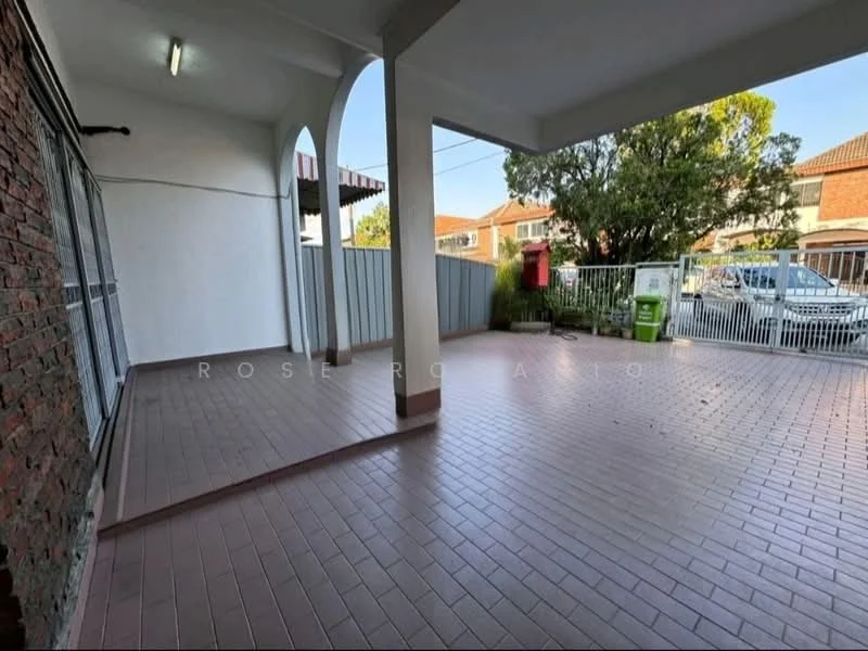 Exterior features: brick wall, tiled flooring, covered porch area, fenced perimeter, manicured landscaping, outdoor space, access to parking, surrounding residential buildings; style: modern.