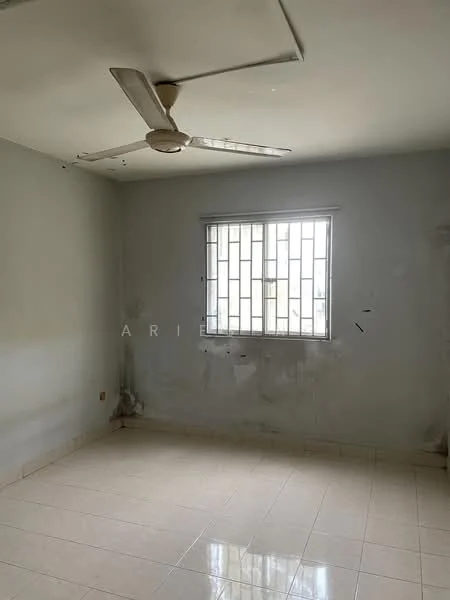 Room features: white painted walls, tile flooring, ceiling fan, window with metal grille, neutral color scheme, no visible furniture, minimal decor, natural light from window.