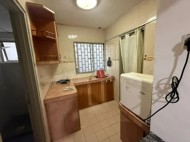 Kitchen features: white tiled walls, cream tiled flooring, wood cabinetry, countertop with integrated sink, single-bowl stainless-steel sink, built-in refrigerator, window with grid pattern, curtains, kitchen appliances, light fixture on ceiling.