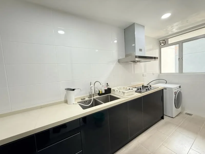 Kitchen features: white tiled walls, light-colored countertop, black cabinetry, single-bowl stainless-steel sink, chrome pull-down faucet, built-in gas hob, stainless-steel range hood, freestanding washing machine, window above sink, recessed LED downlights, tile flooring; style: modern.