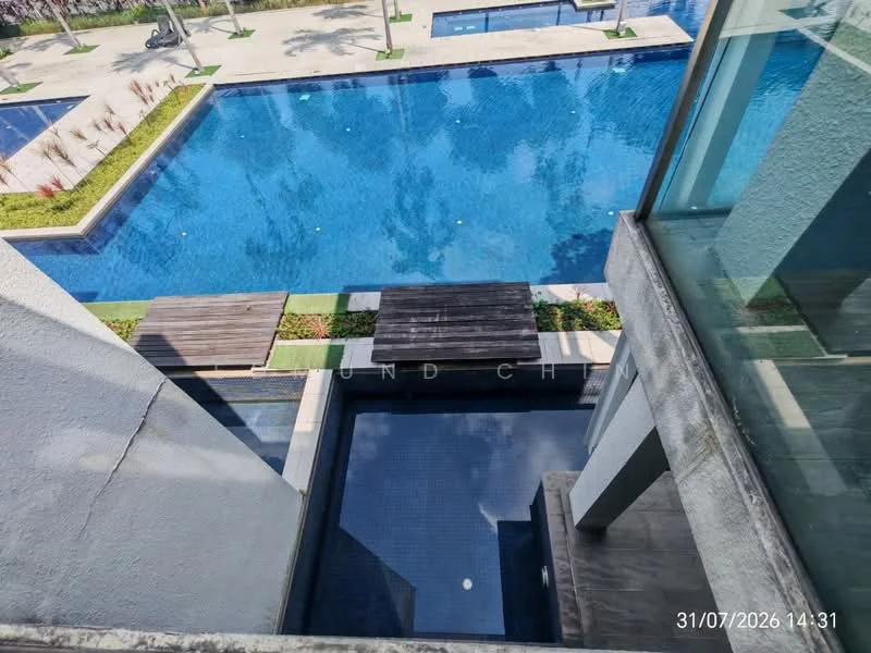 Exterior type: swimming pool deck; features: infinity pool, lap pool, pool deck with loungers, landscaped garden, manicured lawn, paved walkway, water features, surrounding greenery; style: modern.