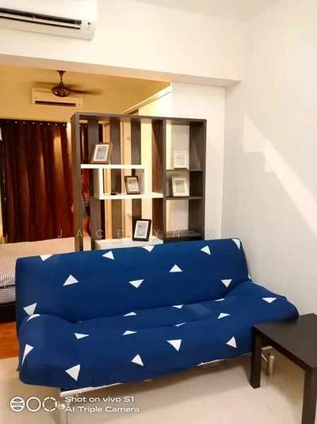Living features: blue fabric sofa with triangle pattern, black coffee table, wooden shelving unit, dark brown curtains, white painted walls, ceiling fan, air conditioning unit; style: modern.