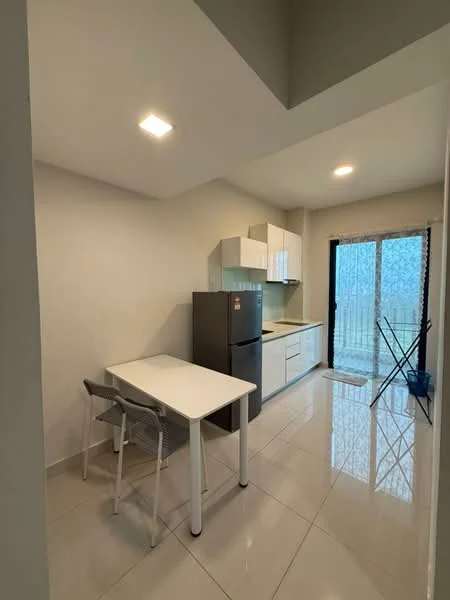 Kitchen features: white cabinets, grey countertop, stainless-steel fridge, built-in oven, ceramic tile flooring, recessed downlights, window with sheer curtains, dining table with two chairs, sliding glass door, laundry rack; style: modern.