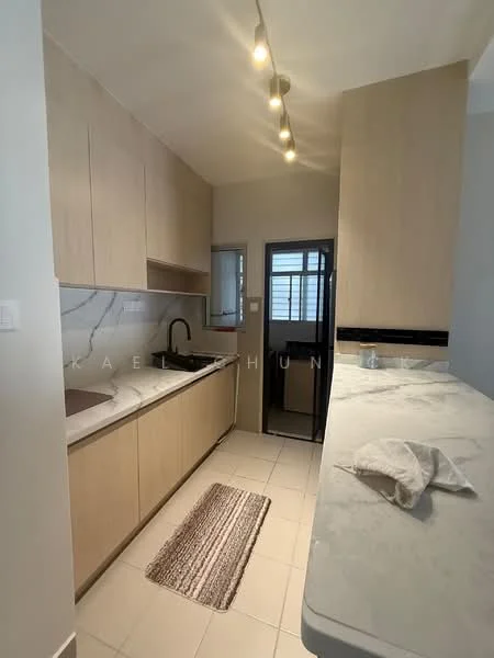 Kitchen features: light wood cabinetry, white marble countertop, single-bowl stainless-steel sink, chrome pull-down faucet, white tiled backsplash, built-in oven, ceramic tile flooring, recessed downlights, window with security grille, kitchen island with seating, area rug with geometric pattern; style: modern.