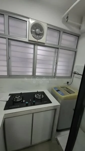 Kitchen features: white cabinetry, black countertop, 2-burner gas hob, stainless-steel sink, wall-mounted split AC, window with horizontal slats, washing machine, tile flooring; style: modern.
