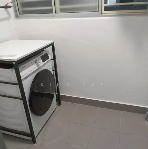 Laundry features: front-load washing machine, white cabinet with metal frame, grey tiled flooring, white painted walls, window with horizontal slats.