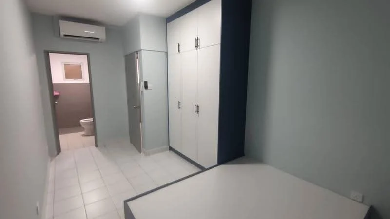 Room features: light grey painted walls, white tiled flooring, built-in wardrobe with white doors, air conditioning unit on wall, sliding door to bathroom, window with no visible treatment, corner shelf or ledge, neutral colour scheme; style: modern.