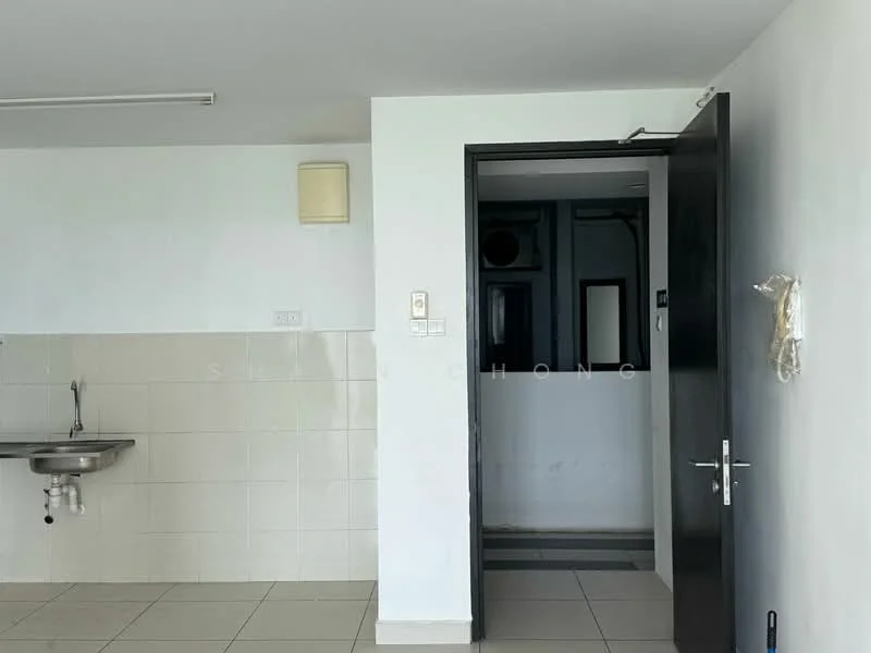 Room features: white painted walls, grey tiled flooring, single-bowl stainless-steel sink, wall-mounted light fixture, door leading to another room, plain ceiling with fluorescent light, neutral color scheme; style: modern.