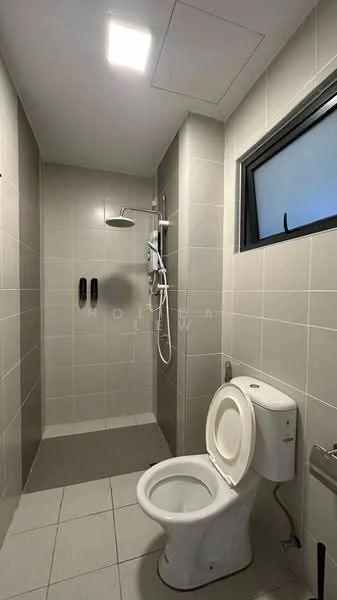 Bathroom features: grey tiled walls, white tiled flooring, walk-in shower with glass partition, rain shower head, handheld shower, chrome shower controls, white one-piece toilet, black framed window, two black wall-mounted soap dispensers, recessed ceiling lights; style: modern.