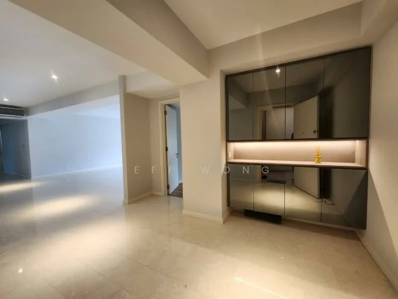 Room features: marble flooring, white painted walls, recessed downlights, built-in cabinetry with glossy finish, open layout, neutral color palette, doorway leading to another room, ambient lighting under cabinetry; style: modern.