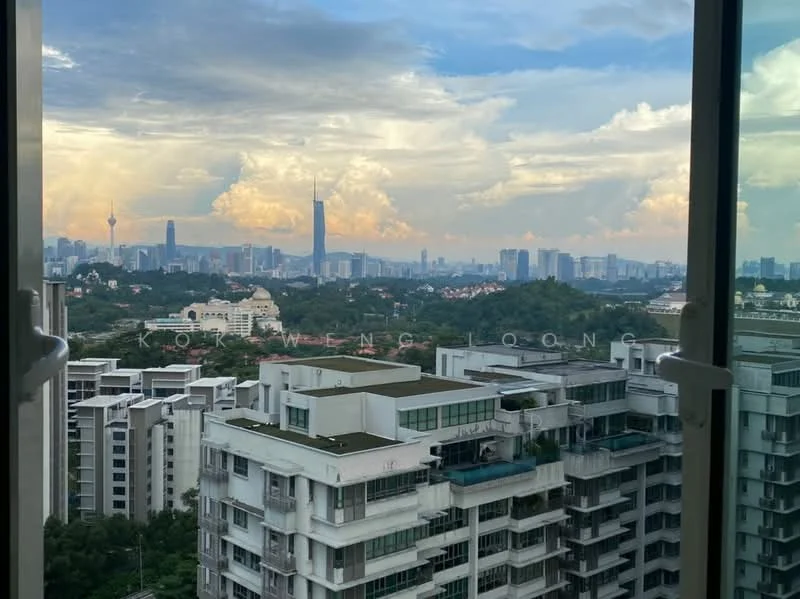 Exterior type: high-rise condominium; features: city skyline view, glass curtain wall, surrounded by greenery, multiple balconies, modern architectural design, urban landscape, cloudy sky, distant landmarks visible; style: modern.