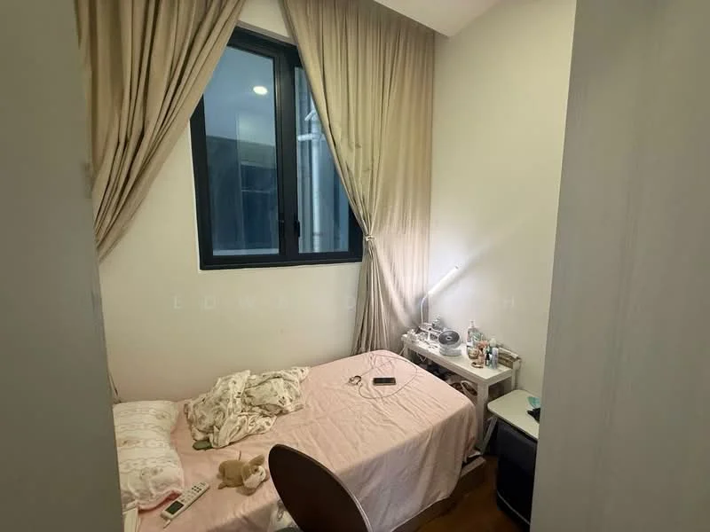 Bedroom features: single bed with pink bedding, wooden bedside table, desk lamp, curtains in light beige, dark wood flooring, window with black frame, wall-mounted shelf, decorative items on the bedside table.