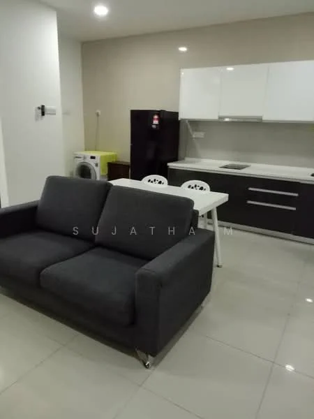 Living features: grey fabric sofa, white dining table, 4 white dining chairs, black refrigerator, white kitchen cabinets, black kitchen cabinets, ceramic tile flooring, recessed downlights, washing machine, kitchen countertop, built-in oven; style: modern.