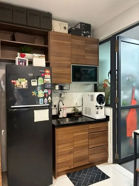 Kitchen features: black granite countertop, brown wooden cabinetry, stainless-steel fridge, built-in microwave, single-bowl stainless-steel sink, chrome pull-down faucet, tile backsplash, white walls, floor-to-ceiling glass door, open shelving, black and white patterned floor tiles, kitchen appliances on countertop; style: modern.