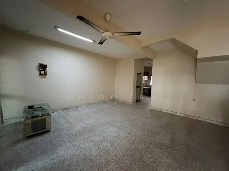 Living features: ceiling fan, wall-mounted light fixture, grey tiled flooring, cream painted walls, large window, open layout, corner wall with slight angle, glass coffee table.