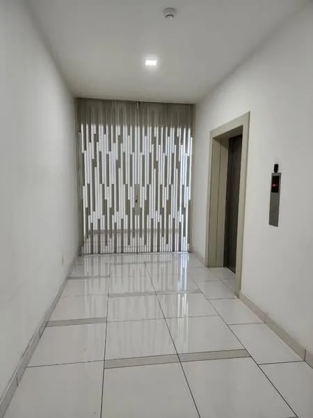Room features: white painted walls, glossy white tile flooring, elevator access, sheer curtain, recessed lighting, neutral color scheme, minimalist design, no visible furniture; style: modern.