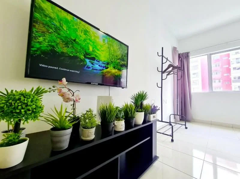 Living features: white painted walls, glossy tile flooring, floor-to-ceiling window, curtains in light grey, wall-mounted TV, black TV console, decorative plants in pots, clothes rack; style: modern.