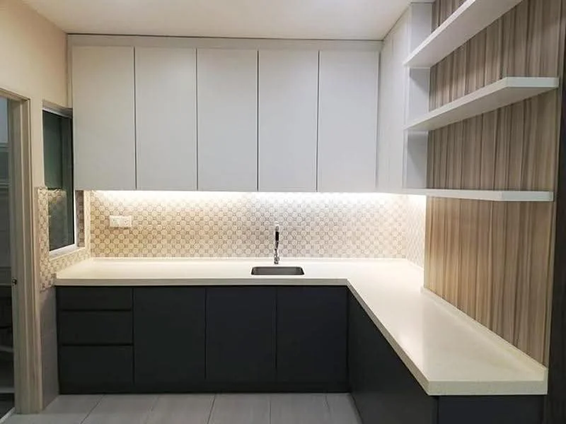 Kitchen features: white upper cabinets, dark grey lower cabinets, quartz countertop, single-bowl stainless-steel sink, chrome pull-down faucet, hexagonal tile backsplash, under-cabinet lighting, open shelving, light grey tile flooring, wood panel accent wall; style: modern.