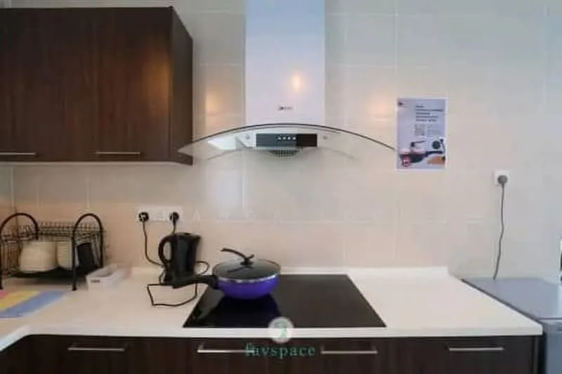 Kitchen features: white quartz countertop, dark wood cabinetry, built-in induction cooktop, stainless-steel range hood, black kettle, purple cooking pot, wall-mounted electrical outlets, tile backsplash, open shelving, recessed lighting; style: modern.