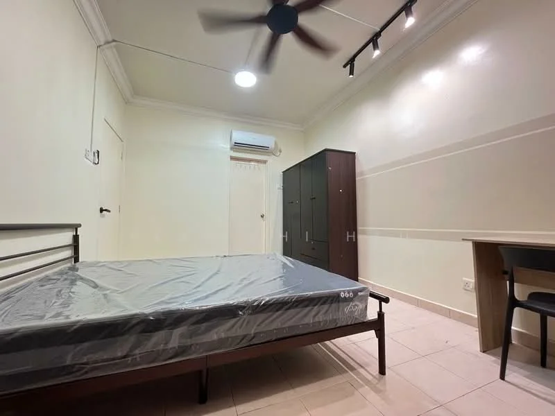 Bedroom features: queen-size bed frame, mattress with protective cover, 5-blade ceiling fan with light, wall-mounted air conditioning unit, built-in wardrobe in dark wood, study desk with chair, cream painted walls, tile flooring, recessed lighting; style: modern.