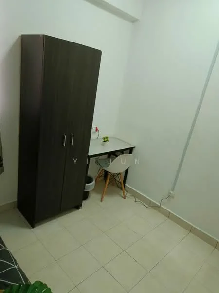 Room features: light-colored tiled flooring, white painted walls, dark wooden wardrobe, small desk with chair, decorative plant on desk, waste bin, power outlet on wall; style: minimalist.