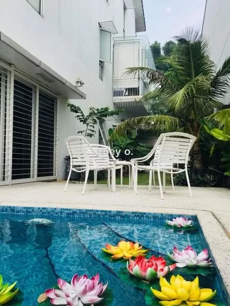 Exterior features: swimming pool with lotus flowers, white patio chairs, tropical landscaping with palm trees, manicured garden, sliding glass doors, white painted facade; style: modern.