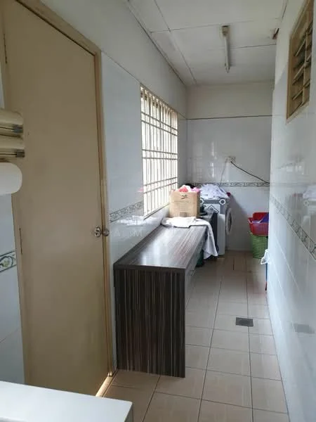 Laundry features: white tiled walls, cream tiled flooring, window with grid pattern, wooden countertop, washing machine, laundry baskets, door, light fixture on ceiling.