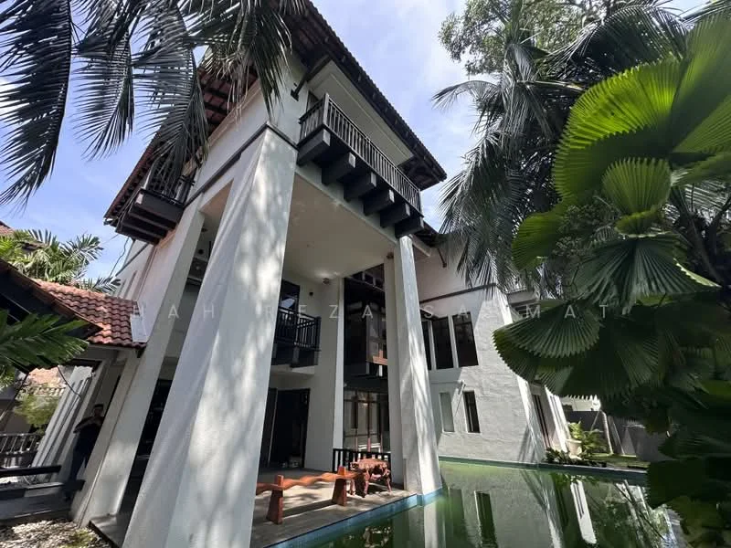 Exterior type: detached bungalow; features: two-storey building, white painted facade, red tiled roof, large windows, balconies with railings, surrounded by tropical landscaping, swimming pool, manicured garden, palm trees, stone-paved walkway; style: tropical-modern.