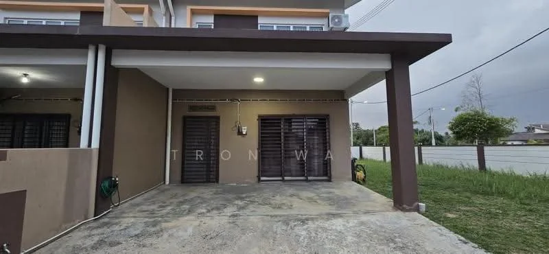 Exterior type: linked terrace house; features: concrete facade with brown and cream paint, two-storey structure, front porch area, sliding glass doors, exposed concrete flooring, external wall-mounted light fixture, garden area with grass, visible drainage system, side access to the property; style: modern.
