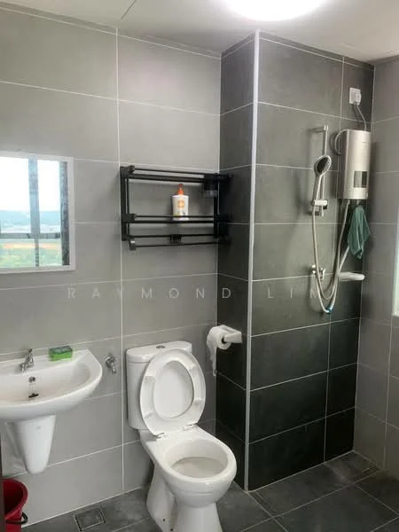 Bathroom features: grey ceramic tile flooring, grey tiled walls, white pedestal sink, chrome basin mixer faucet, one-piece toilet, handheld shower, shower wall with glass partition, black wall-mounted shelving, window with view, toilet paper holder; style: modern; view: garden.