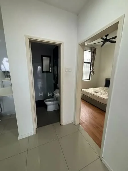 Bathroom features: one-piece toilet, wall-mounted sink, grey tiled flooring, white painted walls, mirror above sink; style: modern. Bedroom features: queen-size bed, upholstered headboard, wooden flooring, ceiling fan, curtains on window; style: modern.