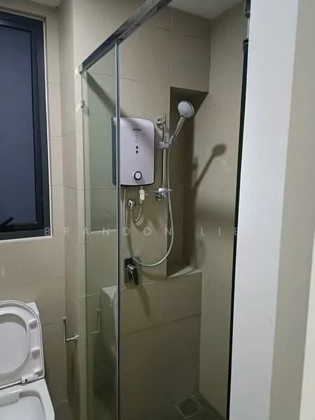 Bathroom features: glass shower enclosure, rain shower head, handheld shower, wall-mounted shower control, toilet, tile flooring, cream tiled walls, window for natural light; style: modern.