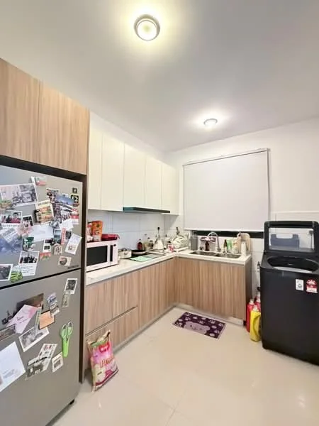 Kitchen features: light wood cabinetry, white upper cabinets, stainless-steel fridge, microwave, white countertop, sink with faucet, black washing machine, cream tiled flooring, recessed ceiling lights, window with roller blind, decorative rug, various kitchen appliances, magnetic knife strip, kitchen utensils, decorative items on countertop; style: modern.