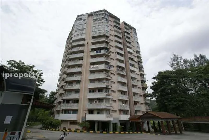 Exterior type: mid-rise condominium; features: cream painted facade, recessed balconies, approximately 10-storey high-rise, surrounded by mature greenery, driveway with interlocking pavers, main entrance gate with awning; style: modern.