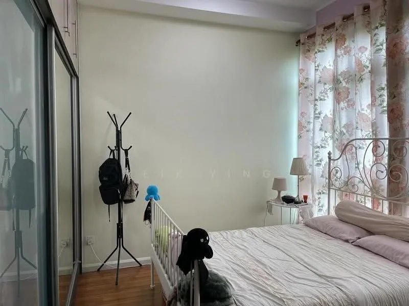 Bedroom features: queen-size bed, white metal bed frame, light pink bedding, floor-to-ceiling mirrored wardrobe, wooden flooring, floral patterned sheer curtains, wall-mounted bedside lamp, clothing rack, decorative plush toys; style: modern.