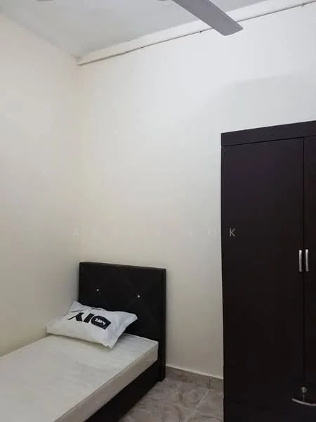 Bedroom features: single bed with mattress, upholstered headboard, dark wood wardrobe, cream painted walls, tile flooring, ceiling fan, decorative pillow on bed.