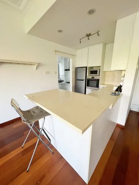Kitchen features: white cabinetry, marble countertop, stainless-steel fridge, built-in oven, microwave, single-bowl stainless-steel sink, chrome pull-down faucet, pendant lighting, wooden flooring, open layout, bar seating area; style: modern.