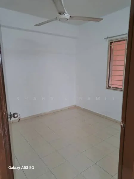 Room features: white painted walls, tile flooring, single ceiling fan, window with horizontal slats, door frame, corner wall, light switch, plumbing outlet.