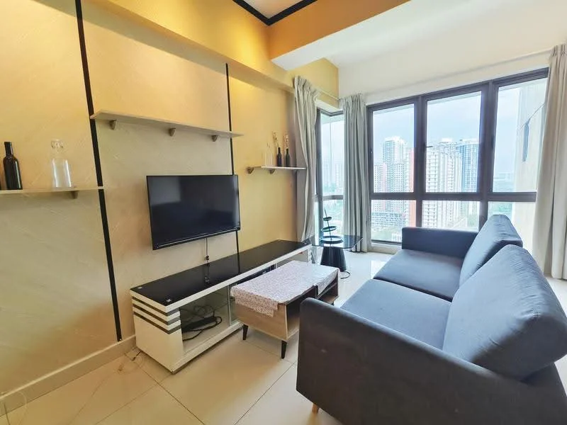 Living features: grey fabric 3-seater sofa, black TV console, wall-mounted flat-screen TV, light-colored accent wall, floor-to-ceiling windows, sheer curtains, decorative shelf with vases, coffee table with light wood finish, tile flooring, recessed ceiling lights, city view from windows; style: modern; view: city.