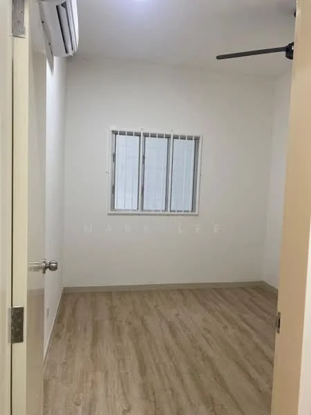 Room features: white painted walls, laminate flooring, single window with horizontal bars, ceiling fan, door with handle.
