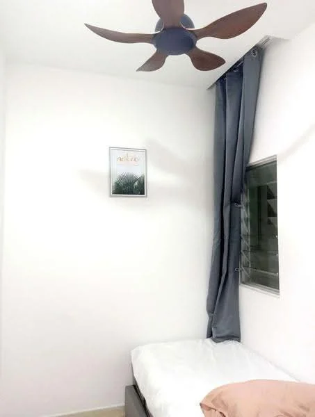 Bedroom features: white painted walls, ceiling fan with 4 blades, single bed with white bedding, grey curtain, window with horizontal slats, framed artwork on wall, light-colored flooring, nightstand; style: minimalist.