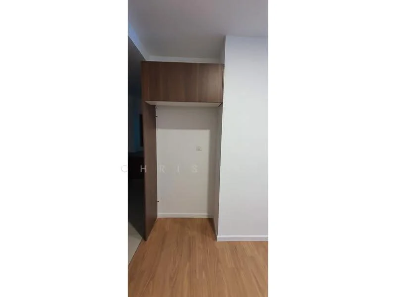 Room features: wooden cabinetry, white walls, laminate flooring, built-in storage space; style: modern.