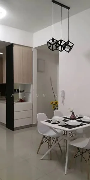 Dining features: white dining table, 4 white chairs, black placemats, decorative vase with flowers, hanging pendant light with geometric design, cream walls, glossy tile flooring, built-in cabinetry with light wood finish; style: modern. Kitchen features: black cabinetry, light wood cabinetry, built-in oven, stainless-steel sink, countertop with minimalistic design; style: modern.